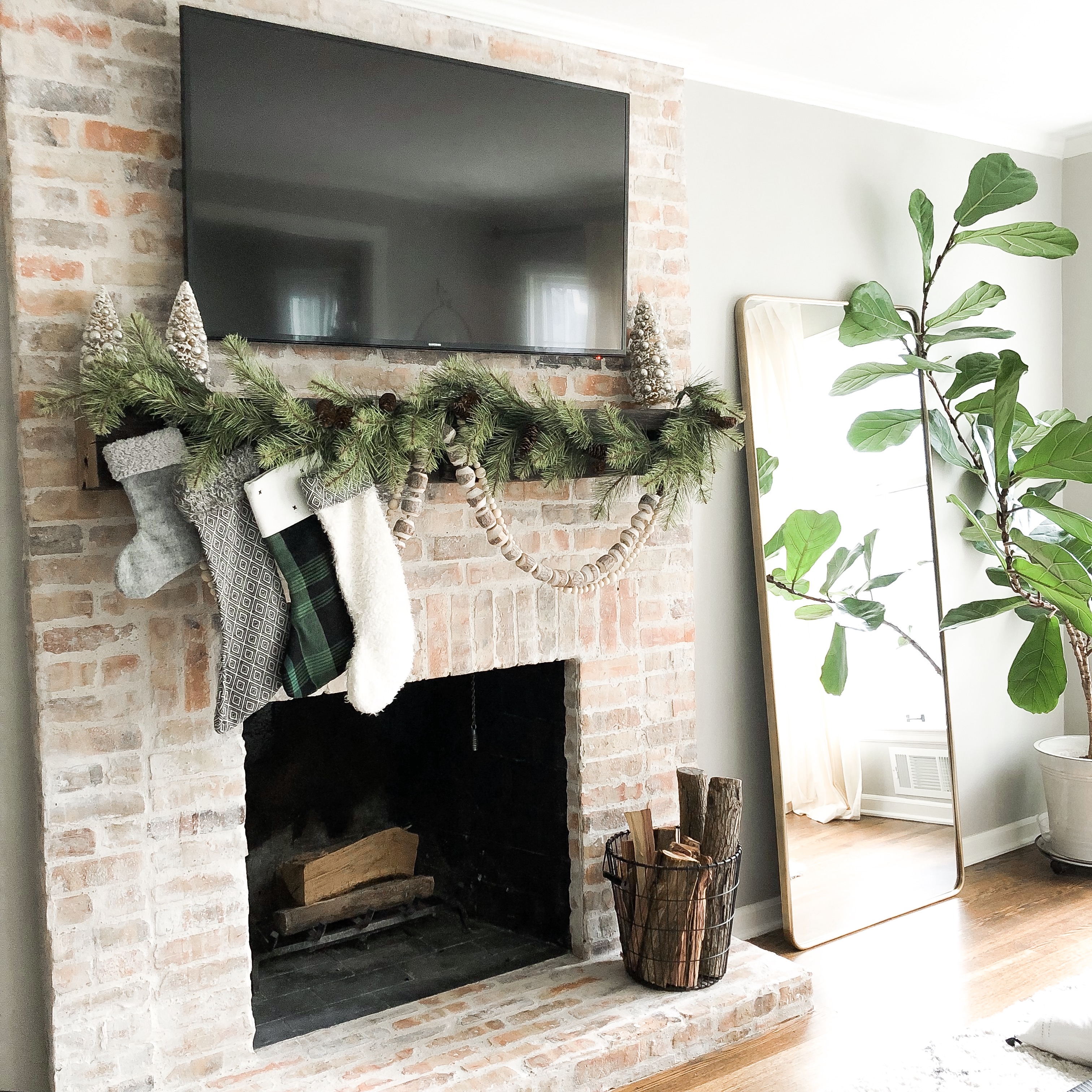 Old Chicago brick fireplace Christmas mantle garland